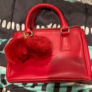 slightly worn red forever 21 handbag